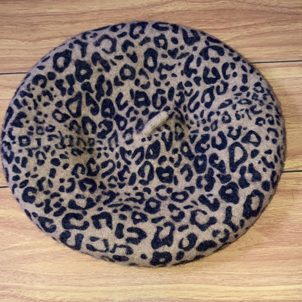 Women’s Berte  Leopard Print Hat color is light brown with Black.